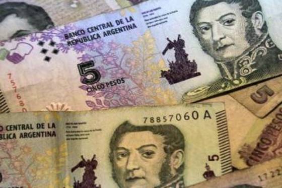 Los comercios que no reciban billetes de 5 pesos serán sancionados